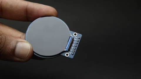 TFT LCD display module of round type held in the hand Stock Footage 345885425