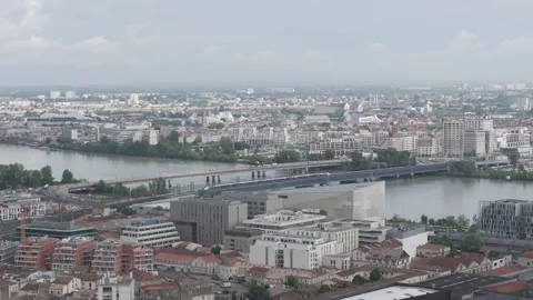 TGV high-speed train crossing the Passerelle Eiffel bridge going over the Stock Footage 274734879