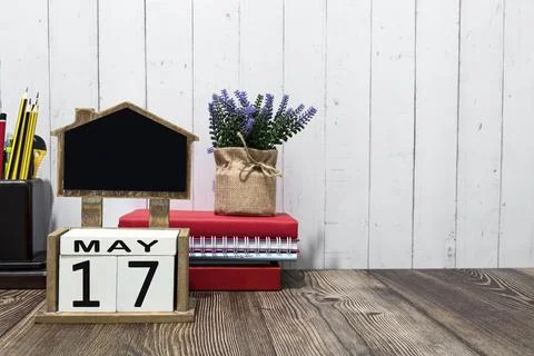 Th May calendar date text on white wooden block on wooden desk Stock Photos
