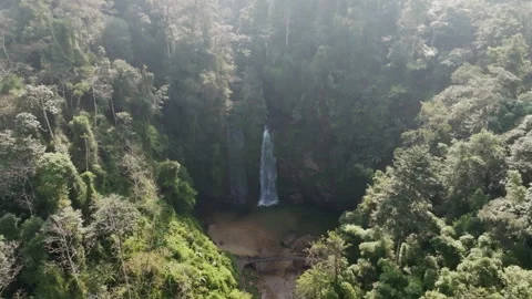 Thác Tiên Waterfall Wide Overhead With Hazy Sunlight on Valley, Hà Giang Vietnam 스톡 동영상 334215971