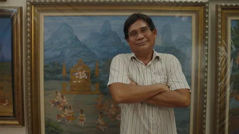 Thai art concept of 4k Resolution. Asian male artist crossing his arms in c.. Stock Footage 314842096