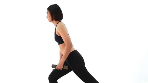 Thai Asian sportswoman is lifting dumbell in single arm bicep standing posture Stock Footage