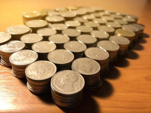Thai Baht coins stack with soft light background. Thai coin in concept of f.. Stock Photos