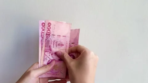 Thai Baht Counting using fingers and hands nominal 100 Baht 스톡 동영상 287583776
