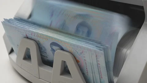 Thai Baht money counting in Machine. Paper THB Thai baht banknotes. Fast cash Stock Footage 171599809