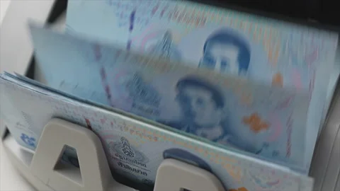 Thai Baht money counting in Machine. Paper THB Thai baht banknotes. Fast cash Stock Footage 171600085