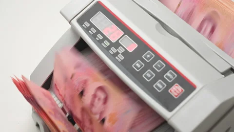 Thai Baht money counting in Machine. Paper THB Thai baht banknotes. Fast cash Stock Footage 171611124