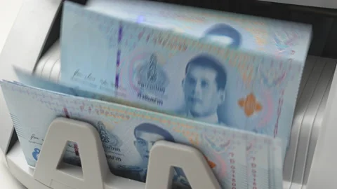 Thai Baht money counting in Machine. Paper THB Thai baht banknotes. Fast cash Stock Footage 171611979