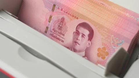 Thai Baht money counting in Machine. Paper THB Thai baht banknotes. Fast cash Stock Footage 171615903