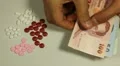 Thai Baht THB, Counting Drugs and Money, Health Care, Colorful Pills HD Footage