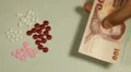 Thai Baht THB, Counting Drugs and Money, Health Care, Colorful Pills HD Footage