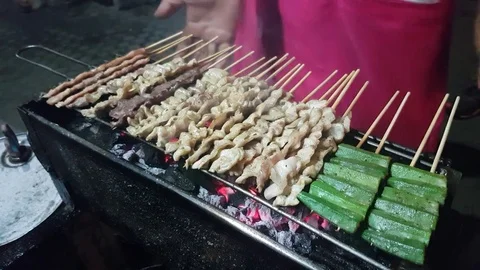 Thai barbecued or Thai style grill on a roadside of Thailand. 4k. Stock Footage 75230250