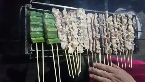 Thai barbecued or Thai style grill on a roadside of Thailand. 4k. Stock Footage 75230756