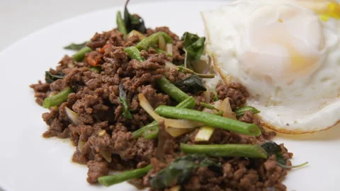 Thai Basil Fried Beef with Rice Stock Footage 146292095