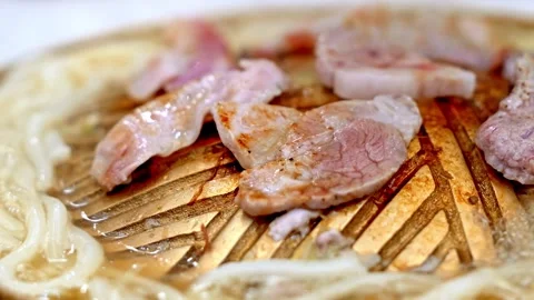 Thai BBQ Moo Kratha Grilling on Hot Pan Stock Footage 344400197