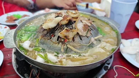 Thai BBQ Mu Kratha Hot Pot on Stove. Stock Footage 340548459