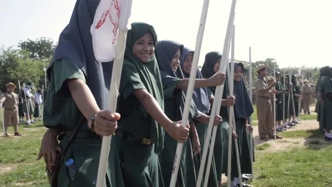 Thai Boy Scout students on parade, Muslim girls in uniform standing in a row Stock Footage 157698960
