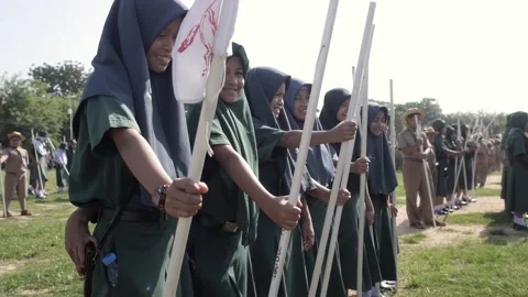 Thai Boy Scout students on parade, Muslim girls in uniform standing in a row Stock Footage 157699079