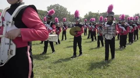 Thai Boy Scout young students on parade marching drum band boys and girls Stock Footage 157699614