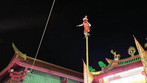 Thai buddhist celebration pole acrobates Stock Footage 83268546