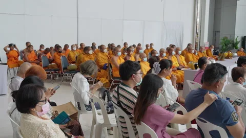 Thai Buddhist Monks &amp; Crowd Audience Sit Wait For Indoor Vesak Festival To Start Stock Footage 247659735