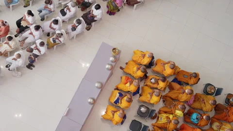 Thai Buddhist Monks &amp; Crowd Sit &amp; Pray During Indoor Visakha Bucha Day Ceremony Stock Footage 247593116