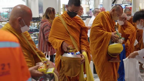 Thai Buddhist Monks Stand, Wait In Line With Alms Bowl To Collect Gift Offering Stock-Footage 247609913