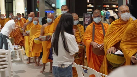Thai Buddhist Monks Stand, Wait In Line With Alms Bowl, Merit Receive Offerings Stock Footage 247618122