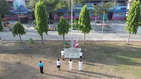 Thai ceremony in the school / respect flag drone shot Stock Footage 192587386