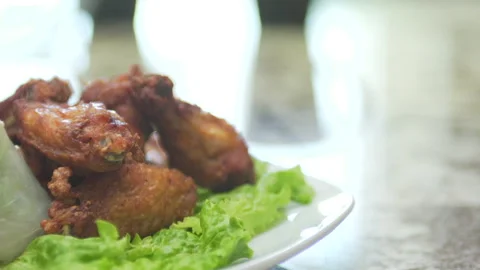 Thai Chicken Wings and Spring Rolls Stock Footage 146292242