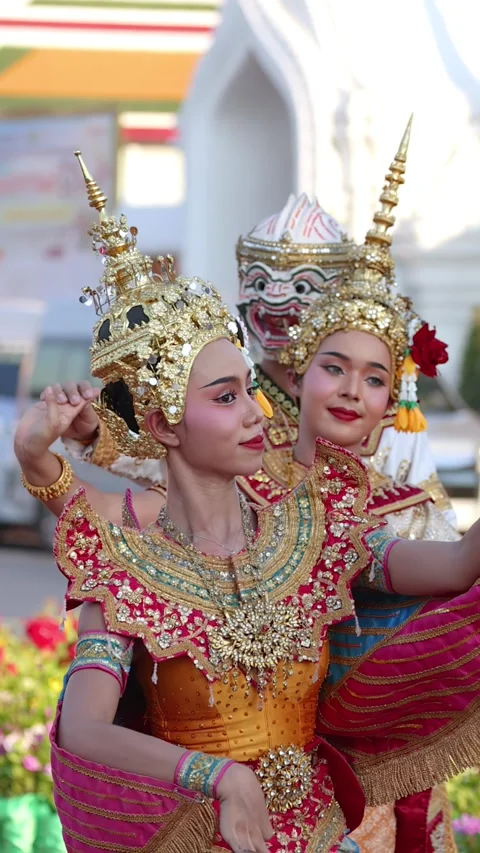 Thai Classical Khon Dancers Perform in Traditional Costumes at Wat Suthat Stock Footage 335621969