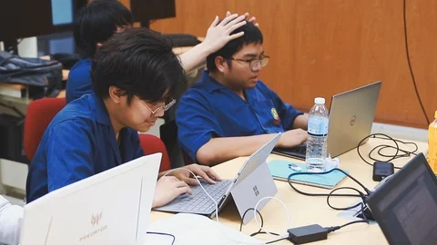 Thai Computer Engineering students working on their final project Stock-Footage 107372150