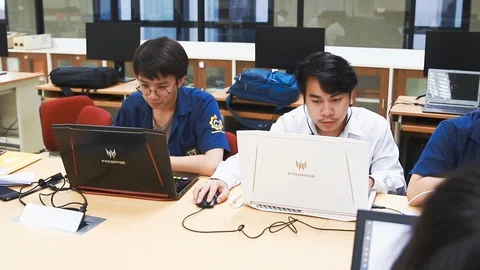 Thai Computer Engineering students working on their assignment Stock Footage 107372416