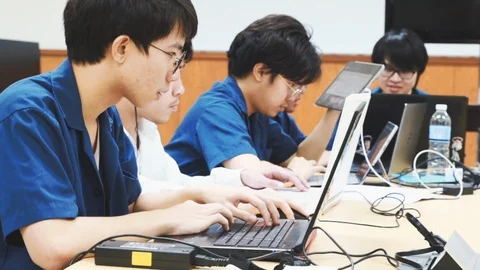 Thai Computer Engineering students working on their classwork Stock Footage 107372809