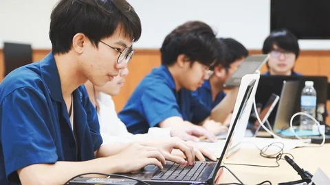 Thai Computer Engineering students working on their report Video stock 107372952