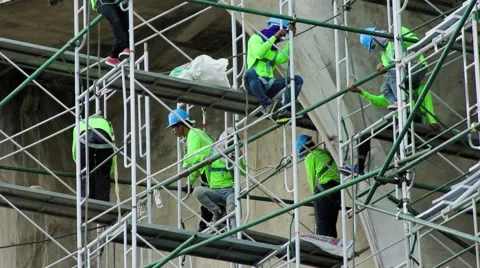 Thai construction workers on scaffolds Stock Footage 41356740
