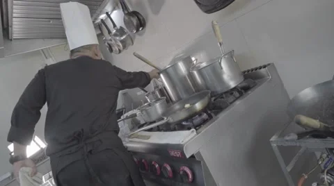 Thai cook setting food on fire, ungraded, slog2 動画素材 60097533