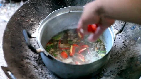 Thai cooking on campfire, Thai folk food Stock Footage 76480717