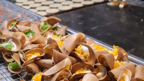 Thai crispy pancakes or crispy crepes Stock Footage 259159841
