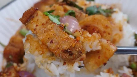 Thai Crispy Pork Belly Stir-Fried with Chili and Salt Served Over Steamed Jasmin Видео 338212090