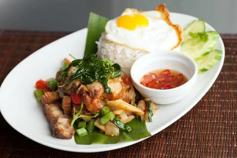 Thai Crispy Pork with Fried Egg Stock Photos