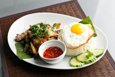Thai Crispy Pork with Fried Egg Stock Photos