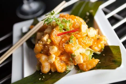 Thai crispy shrimp dish with apple and sesame seeds presented beautifully on  Stock Photos