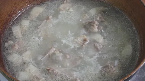 Thai curry paste with spiciness full of Thai herbs boiling in the pan. Stock Footage 218409898