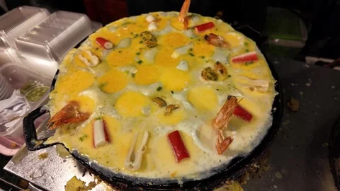 Thai Egg Dish with Shrimp and Seafood Cooking in a Large Pan Stock-Footage 342500927