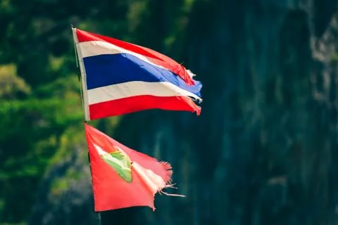 Thai flag with mountains in the bakground, Phi Phi Leh, Thailand. Stock Photos