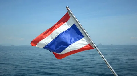 Thai flag waving on boat in ocean Stock Footage 36338537