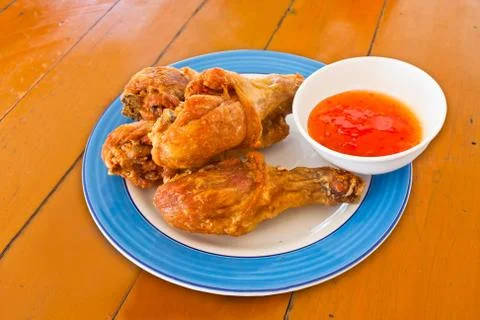 Thai fried chicken on disk. Stock Photos