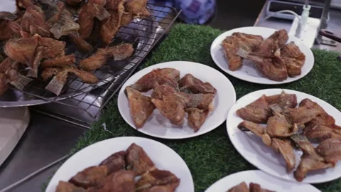 Thai Fried Crispy Fish, Sliced &amp; Cut For Sale At Street Food Open Night  Market Stock Footage 233656358