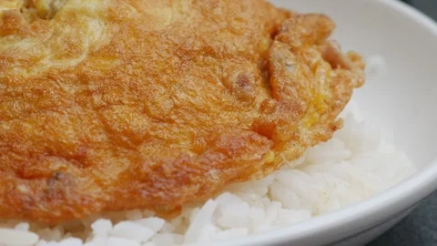 Thai Fried Egg with Minced Pork Over Rice Stock Footage 327949502